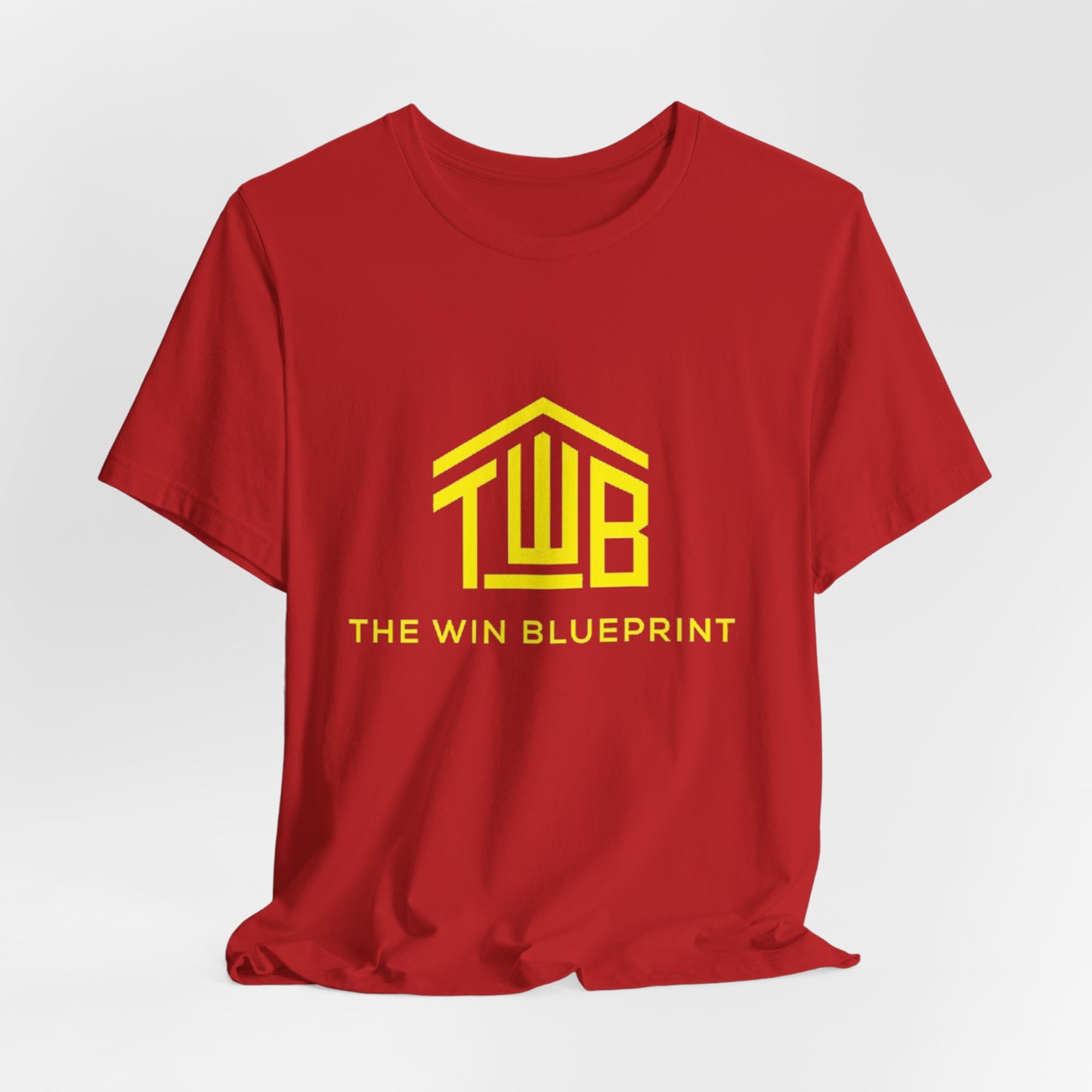 The official The Win Blueprint Tee — Yellow Logo Graphic T-Shirt