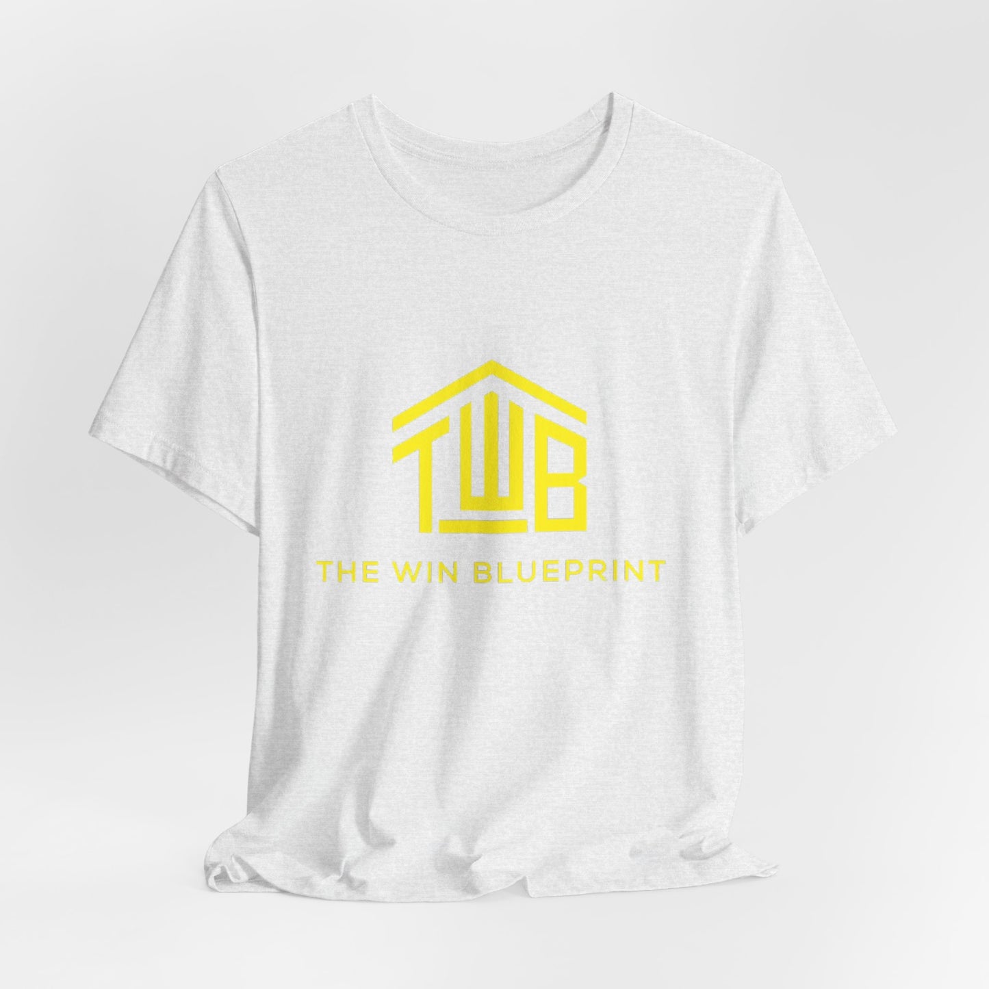 The official The Win Blueprint Tee — Yellow Logo Graphic T-Shirt