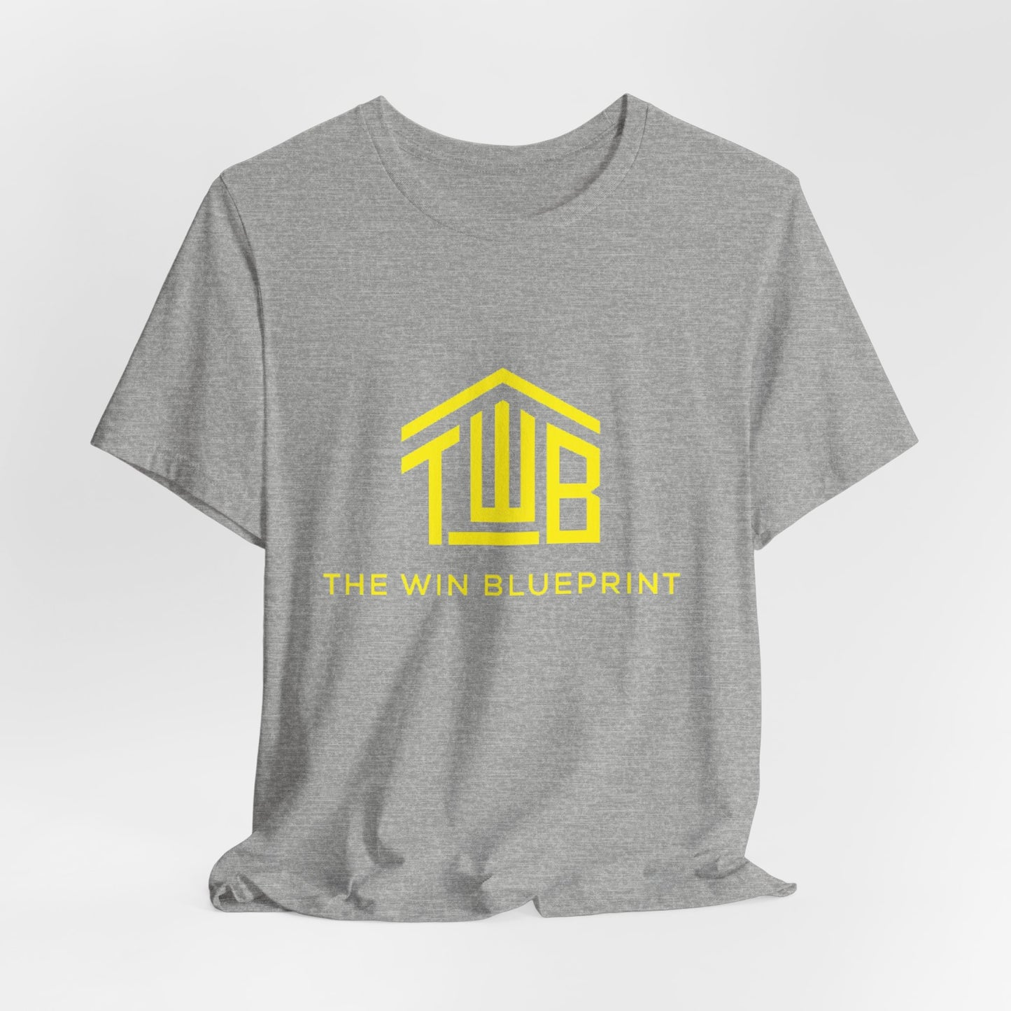 The official The Win Blueprint Tee — Yellow Logo Graphic T-Shirt