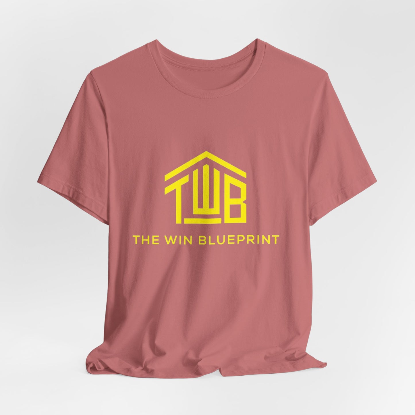 The official The Win Blueprint Tee — Yellow Logo Graphic T-Shirt