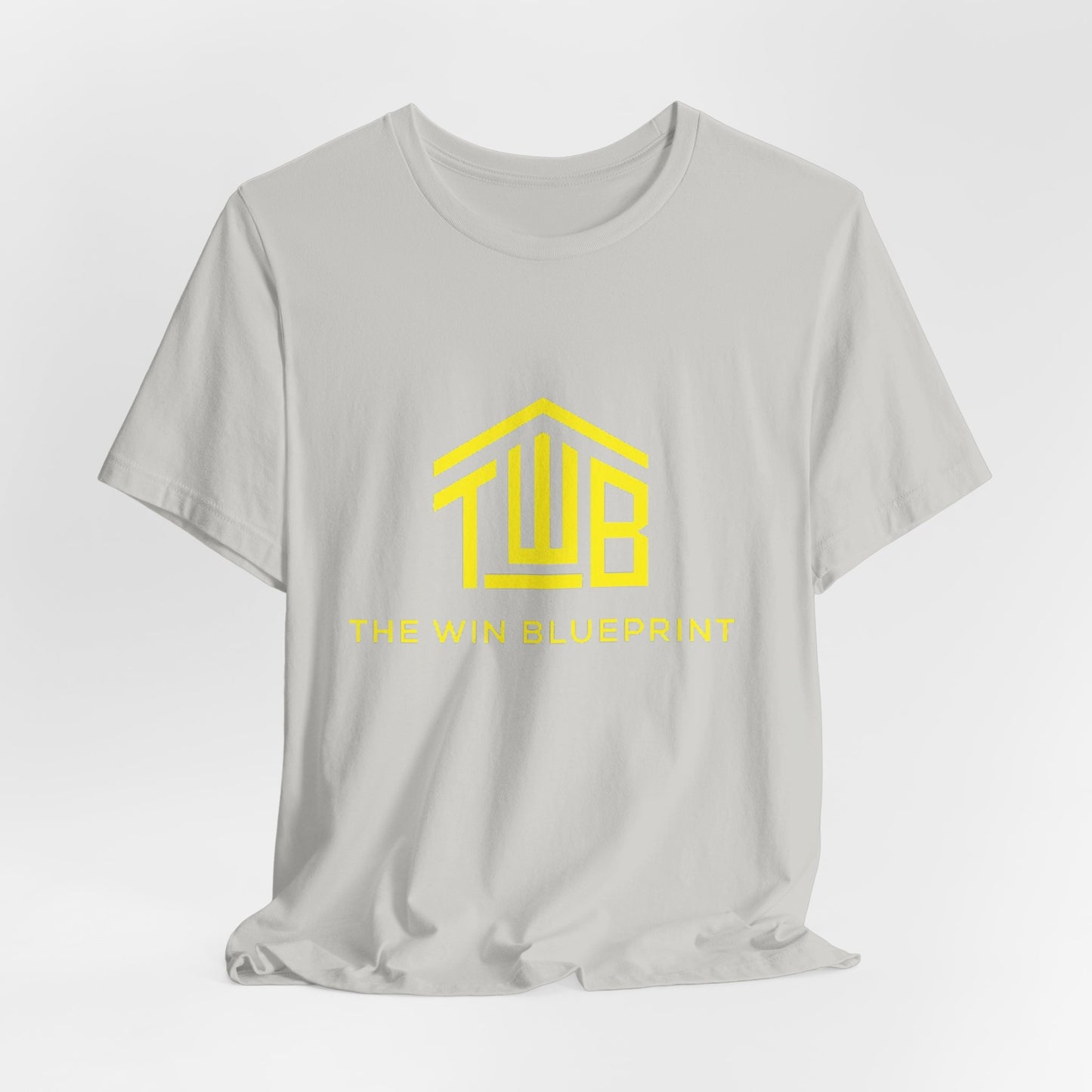 The official The Win Blueprint Tee — Yellow Logo Graphic T-Shirt